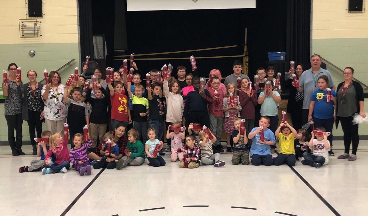manitouwadge public school, students holding up water bottles