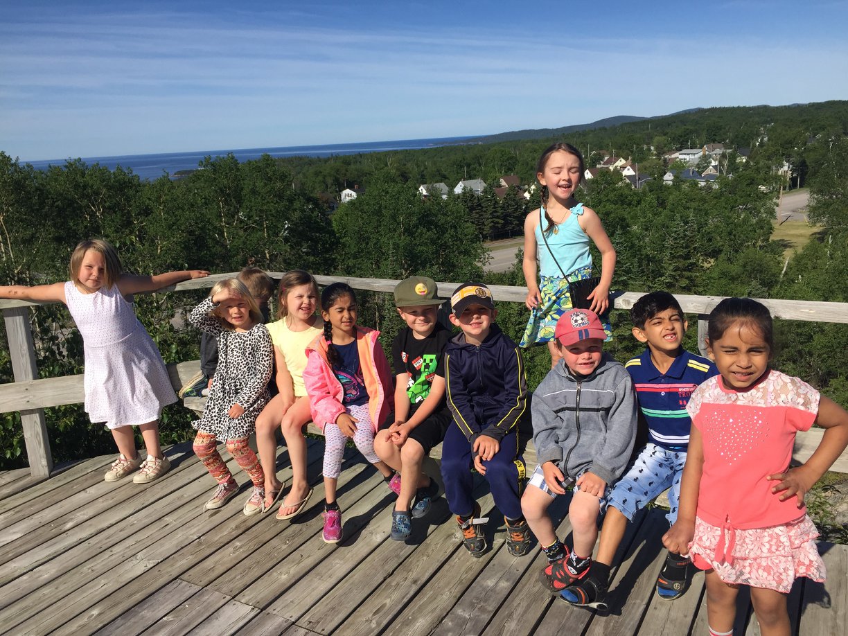 Group of children learning outdoors