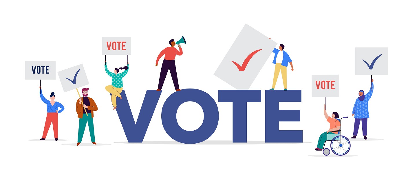 Multiple people holding vote signs
